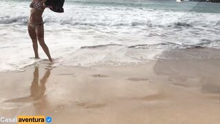 Quickie on a paradise beach - people near