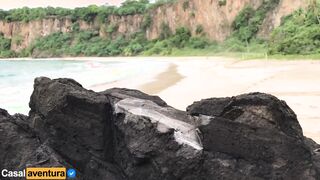Quickie on a paradise beach - people near