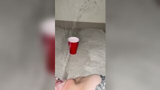 Piss spray inside solo cup