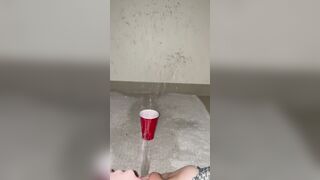 Piss spray inside solo cup