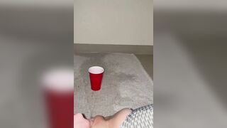 Piss spray inside solo cup