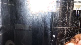 Young man eating his friend's aunt into the restroom of