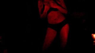 Dancing for you inside the dark and taking off my