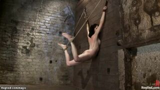Faced to the wall brunette flogged