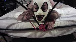 She's bound up on a bed with a front camera, you can watch how rough she's banged! by her master