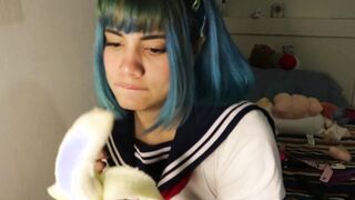 Deep throat: school girl slips a whole banana into her mouth.