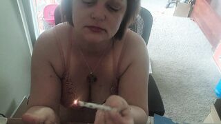 Bombshell dark haired smoking 420