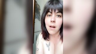 She smokes and moves provocatively inside the WC while changing clothes