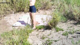 Sensual nudist masturbates on the beach and licks foot