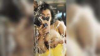Lactating momma sprays mirror over and over