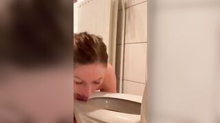 Pisswhore cleans up her mess from the toiletseat