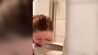 Pisswhore cleans up her mess from the toiletseat