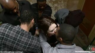 Bound brunette takes big black cocks