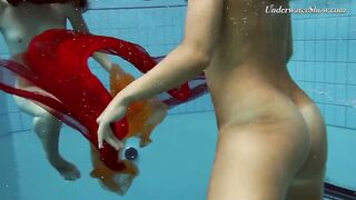 Liza and Krasula enjoy the pool much