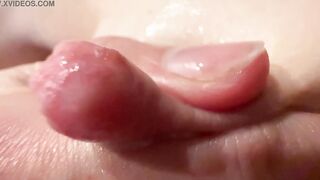 Female breast milk and nipple close up