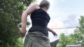 flashing inside outdoors with a corset on and upskirt gothic grunge cunt with mouth shows you her treasures