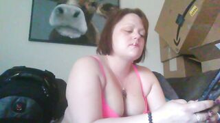 Just a Bombshell dark hair smoking a cig.