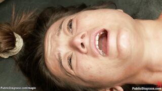Bound brunette fucked in public
