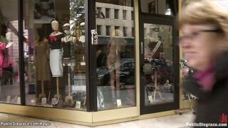 Naked blonde bound in shop window