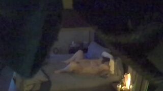 Woman alone inside bed masturbating caught on concealed camera.