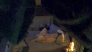 Woman alone inside bed masturbating caught on concealed camera.