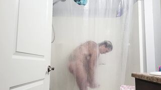 Spying on gf taking a shower