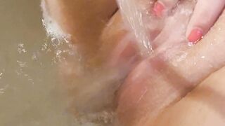 Bathtub fun- letting the water flick my clitoris and nipples