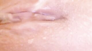 Bathtub fun- letting the water flick my clitoris and nipples