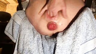 Spread Slave plays with her prolapsed holes and births a hugest kong dildo