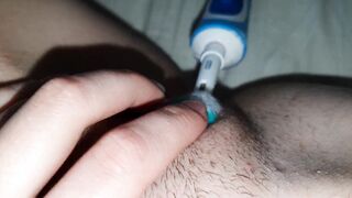 Masturbation with an electric toothbrush