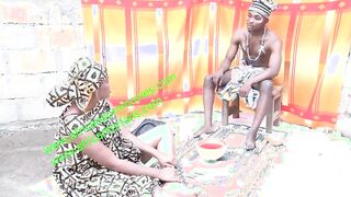 the muscular traditional ebony bondage marabout with a bodybuilding body