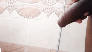 Rajesh peeing into the restroom