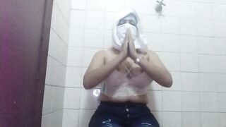 Real Arab in Hijabi and Niqab Masturbates and Squirting Wet Creamy Pussy