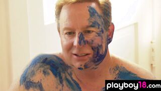 Artist using bodies to create paintings
