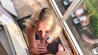 Submissive cunt with mouth with a mouthful of cum on the balcony