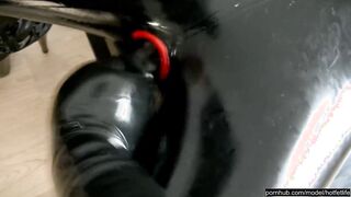 Vulgar encasement pvc bitch with mouth gag gets inflatable toys inside her 2 holes