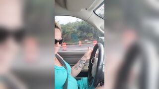 Adorable Beauty Smoking wearing Sunglasses and Mini Dress Driving Truck