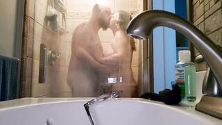 Sex inside glass shower.