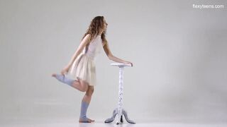 Ursula Fe dark hair curly hair gymnast