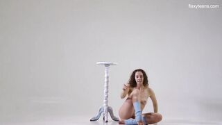 Ursula Fe dark hair curly hair gymnast