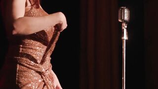 Red milf singer Maitland Ward reveals her boobies during her enchanting song