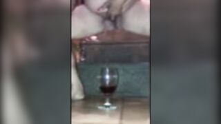 Drinking my piss from my glass of crown royal