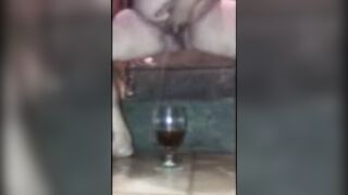 Drinking my piss from my glass of crown royal