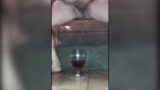 Drinking my piss from my glass of crown royal