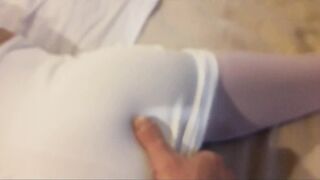 Laura is wearing a hot white dress, pink stockings and platform heels, bound up and gagged into a bed