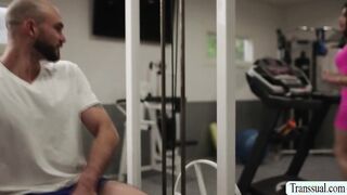 Attractive shemale gets analed in the gym
