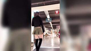 Micro mini skirt outside with overknee boots 