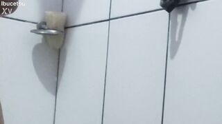 beauty young faraga into the WC taking a shower