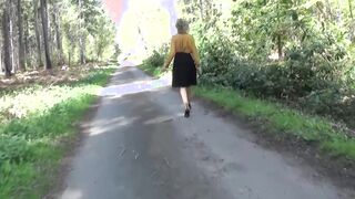 Big Tit housewife stripping into the woods