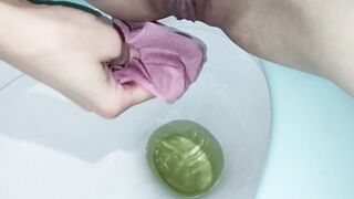 Women pee inside the school restroom